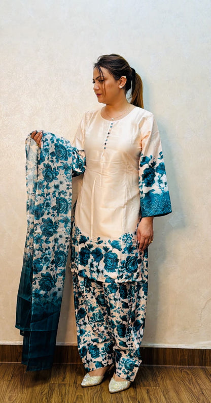Peach satin suit with teal floral print and farsi salwar, holding matching dupatta – front view, SS-1010