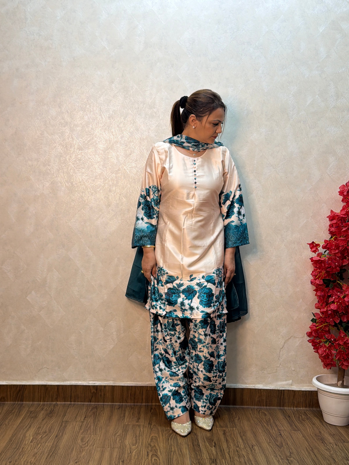 Side view of peach satin kurta with teal floral print and draped dupatta, SS-1010