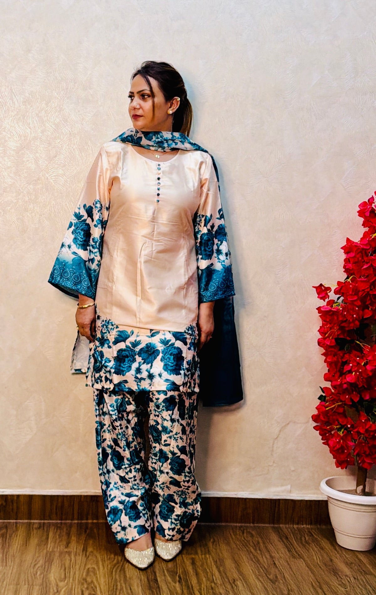 Woman wearing peach satin suit with teal floral print and farsi salwar, festive wear, SS-1010