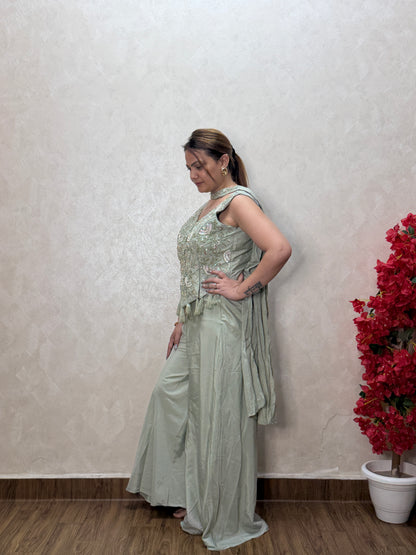 Side view of sage green indo-western dress showing embroidery detail and dupatta drape, SS-1011